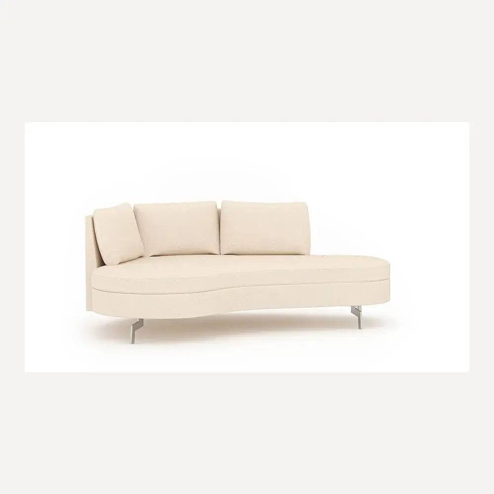 Ein cremefarbenes Nierensofa aus Stoff mit Edelstahlfüßen von Desede Switzerland.
