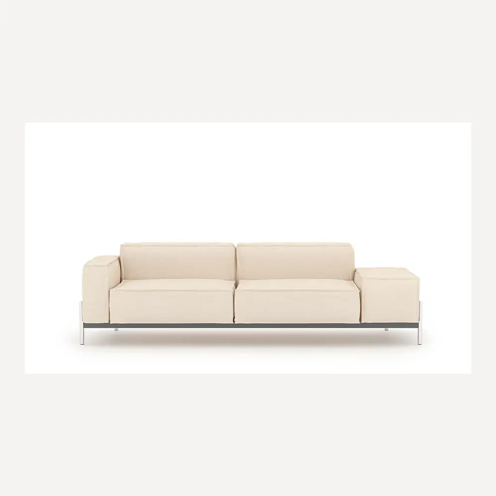 Ein cremefarbenes Stoffsofa von Desede Switzerland mit Edelstahlfüßen und kubischem Design.