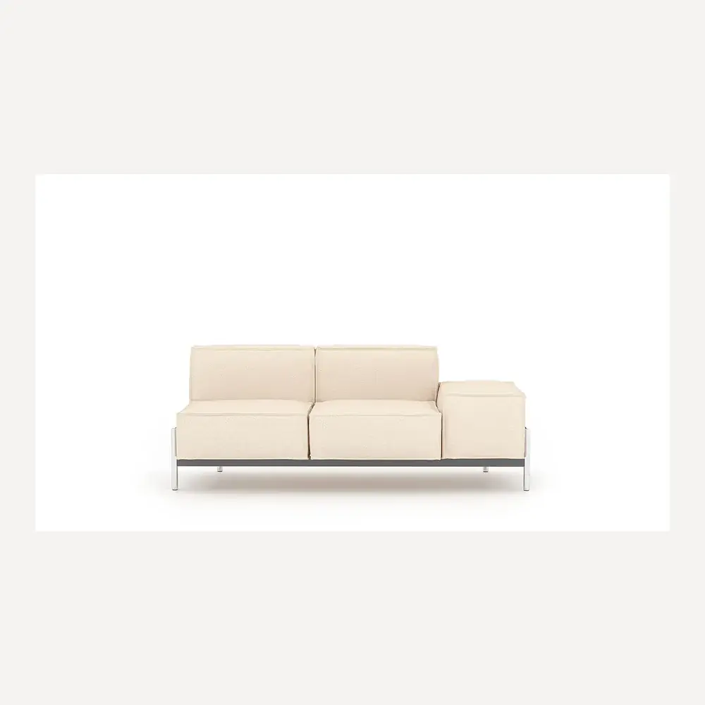 Helles Ledersofa von Desede Switzerland mit kubischem Design und Edelstahlfüßen.