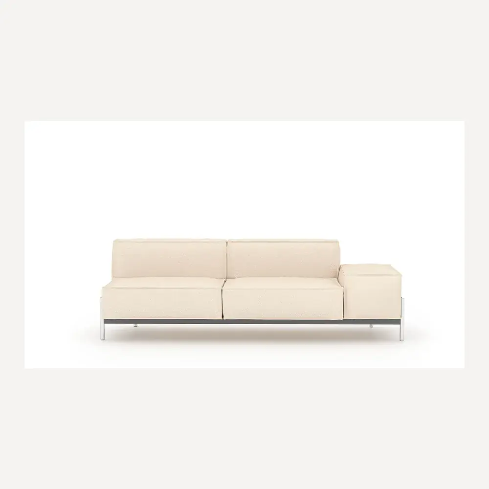 Helles Stoffsofa von Desede Switzerland mit Edelstahlfüßen und praktischem Zwischenelement.