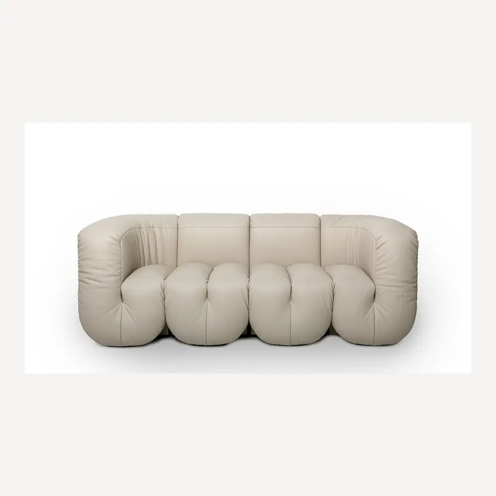 Cremefarbenes Ledersofa von Desede Switzerland mit einzigartiger, mäanderartiger Form.