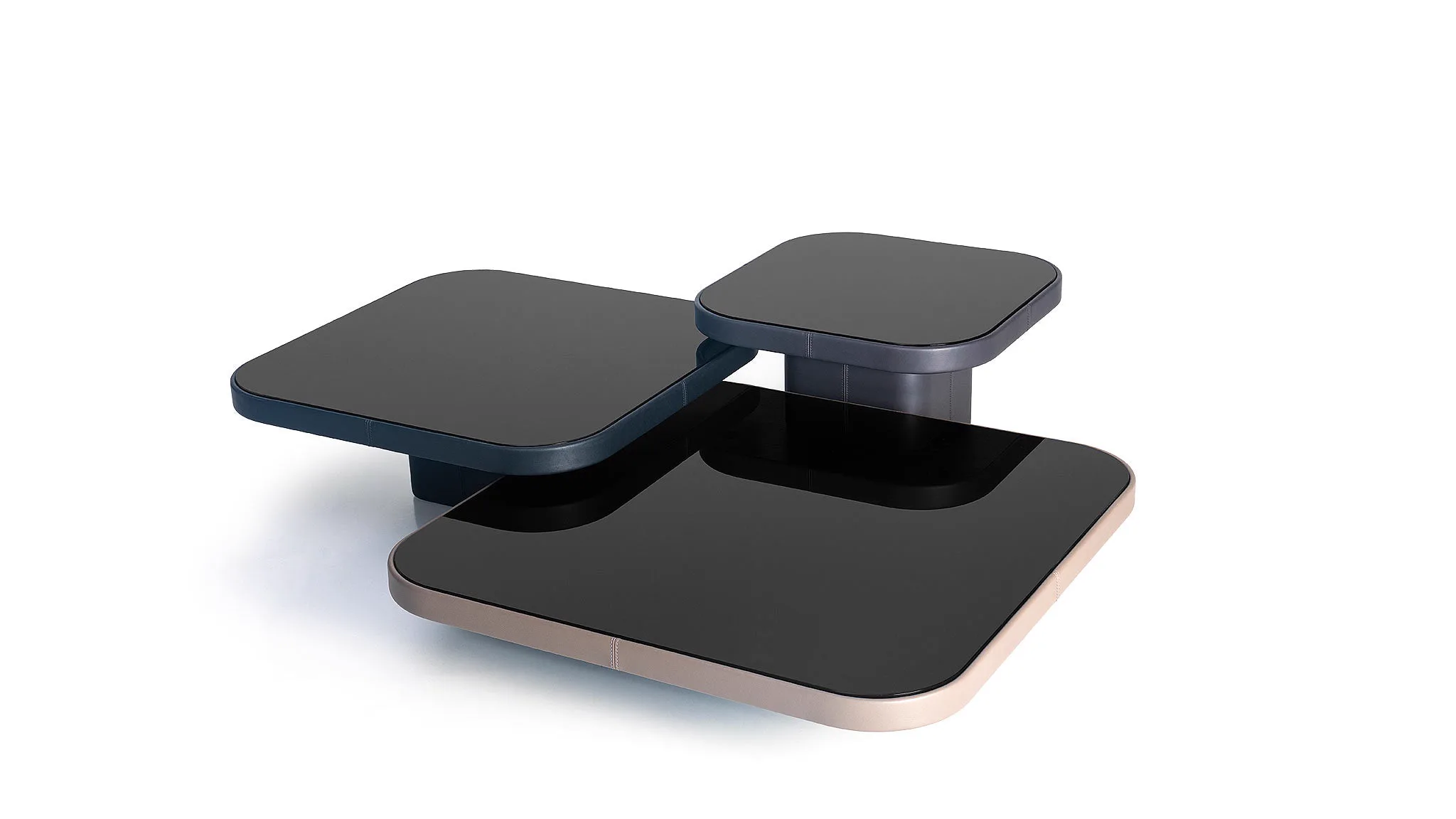 Drei schwarze Couchtische mit Glasplatten und Leder von Desede Switzerland.